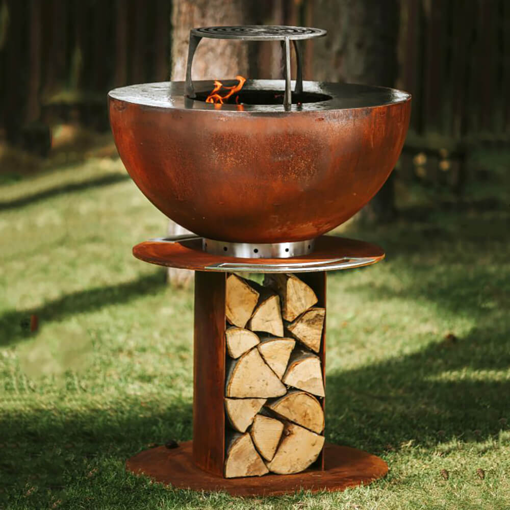 Barbecue de jardin rond en acier de couleur rouille avec compartiment pour le bois - Masuria - Stilo Grill / 106x80x80cm (HxLxP) / oui